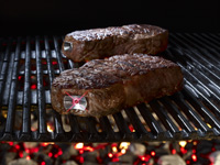 SteakChamp_-Steak-with-flashing-steakchamp-on-grill
